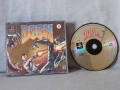 Doom Ps1 Caratula Delantera y Disco.jpg